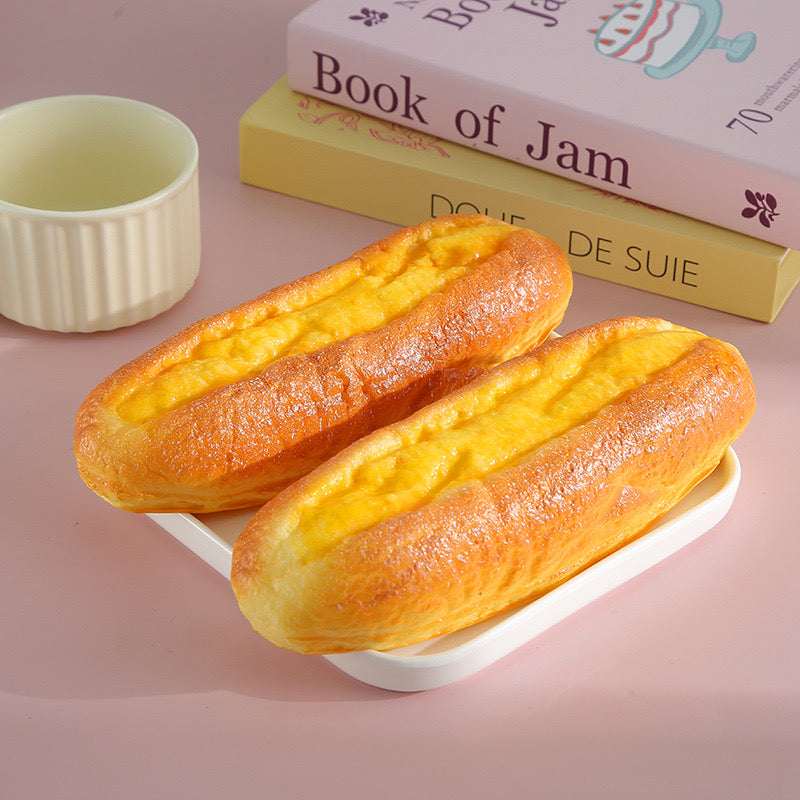 Youtiao Slow-Rising Squishy – Golden Chinese Fried-Dough Bread Shape with Rounded Edges and Textured Center Channel
