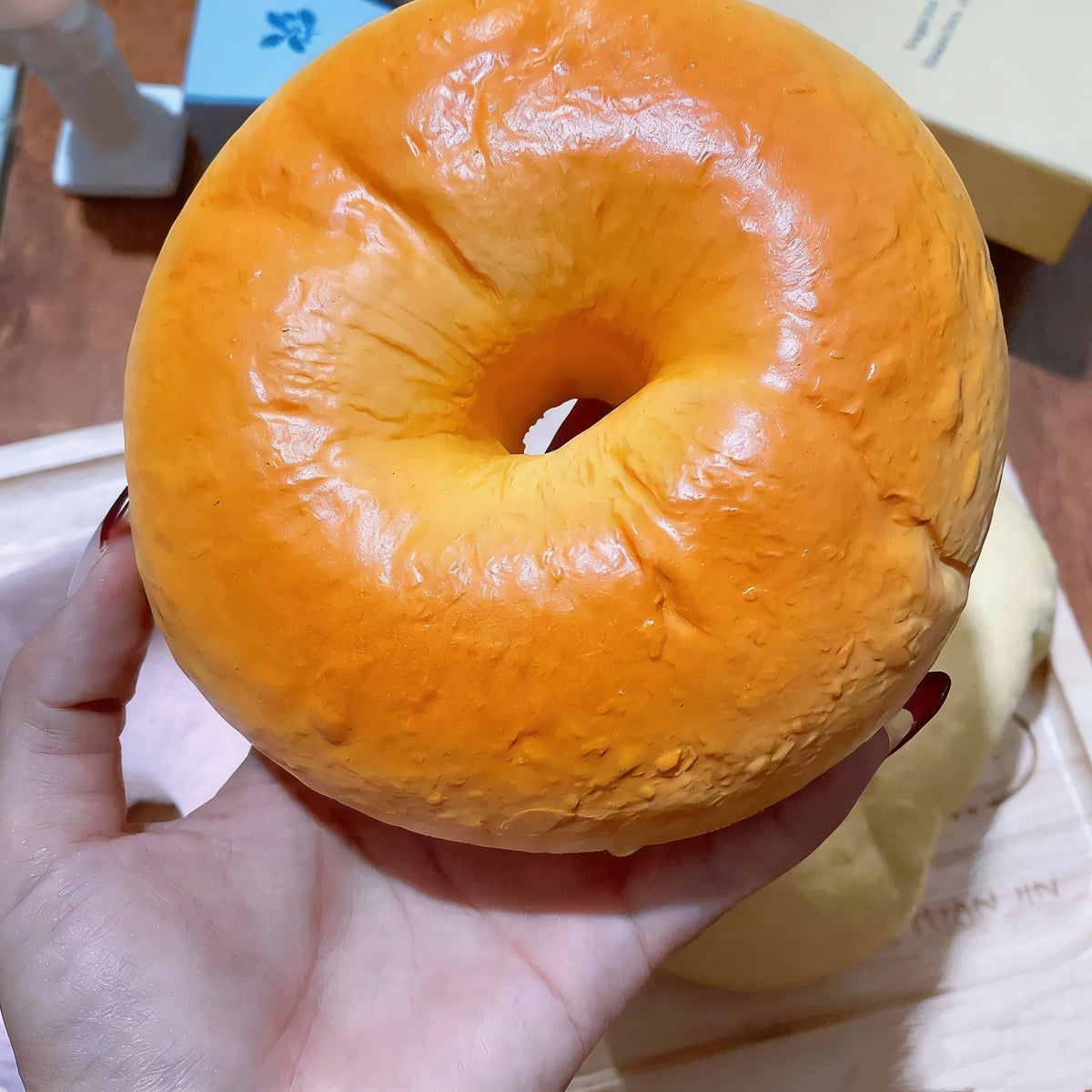 Bagel Slow-Rising Squishy – Golden Bread Ring Squeeze Toy with Cream Rim & Textured Bakery-Inspired Finish