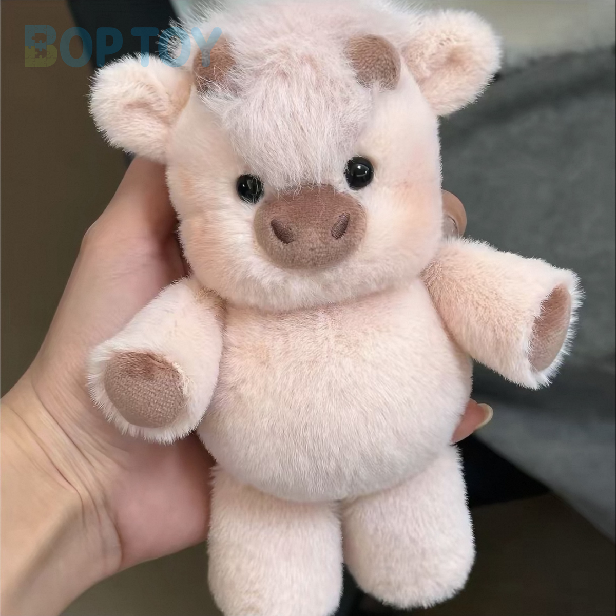 Guava Pink Highland Cow plush bag charm, actual product photograph