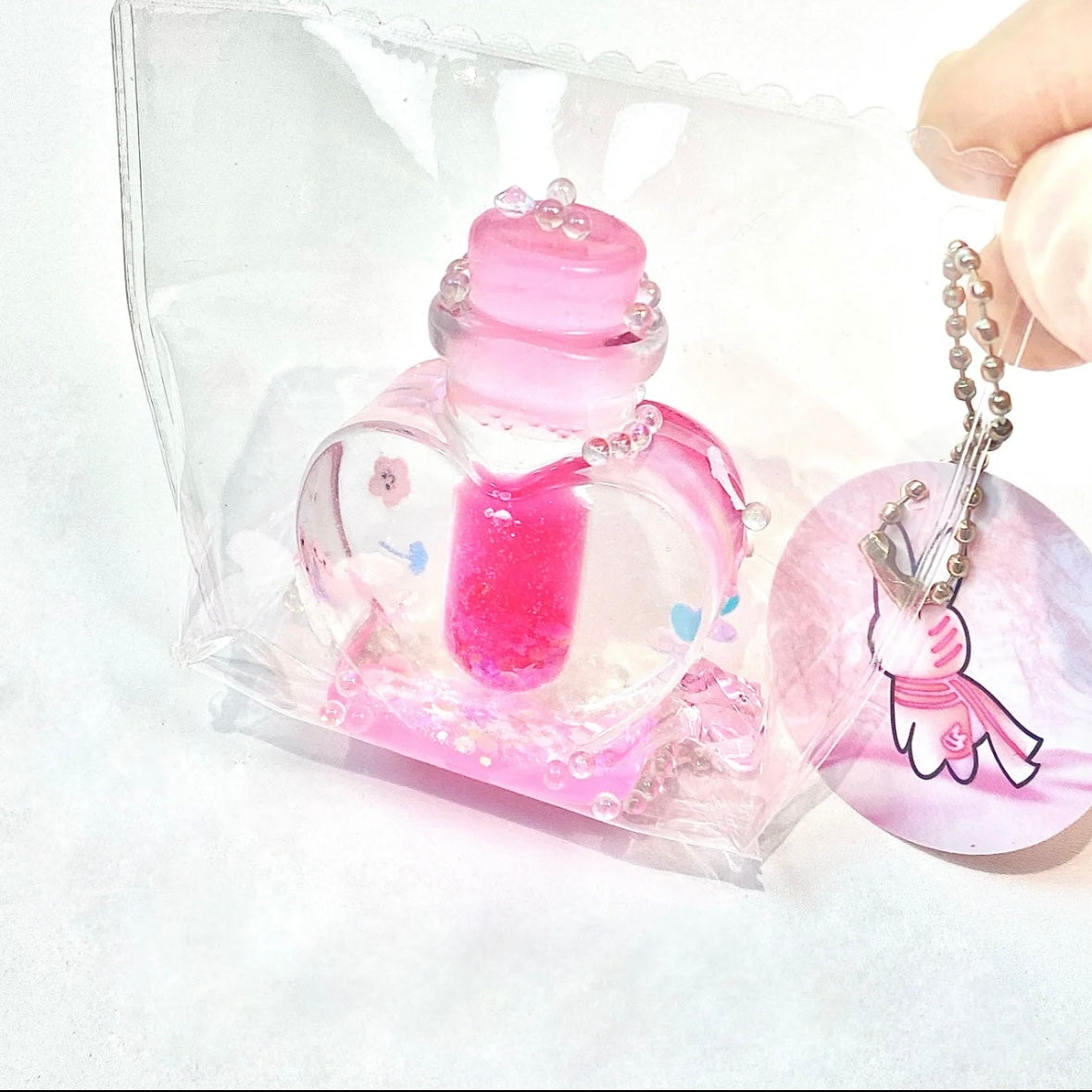 Transparent Heart Shape Wish Bottle Taba Squishy Toy – product image 2