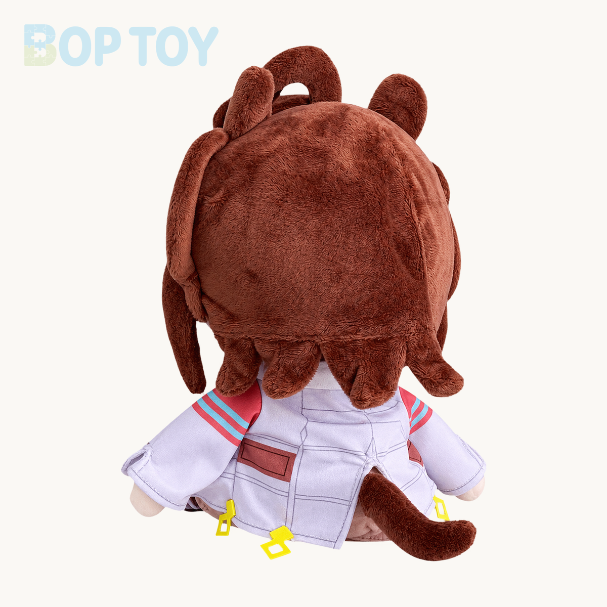 rear view - brown-haired sitting plush doll