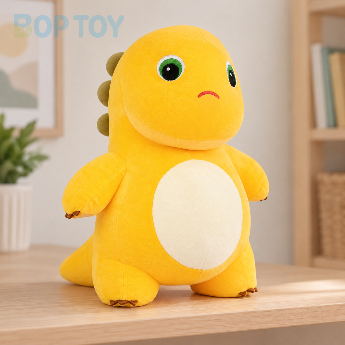 Frowning yellow dinosaur plush toy standing on a bedroom shelf