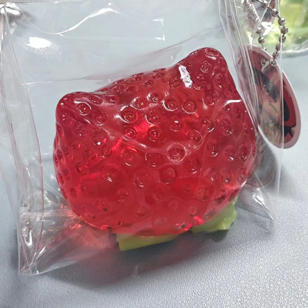 Handmade Transparent Cat Head Strawberry Taba Squishy Toy – product image 2
