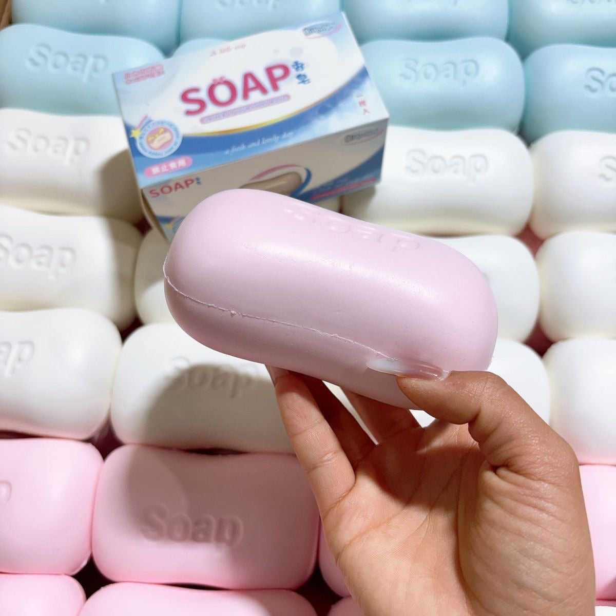 Soap Bar Slow-Rising Squishy – Rounded Squeeze Toy with Molded Soap Lettering in White, Pink or Blue