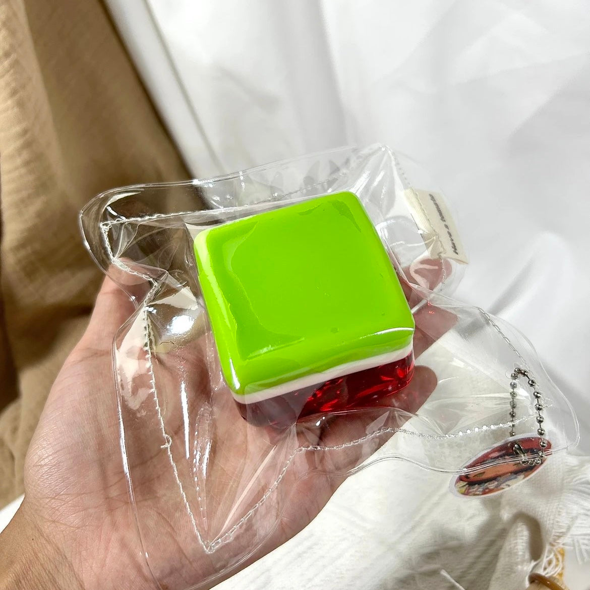 Transparent Watermelon Cube Taba Squishy Toy – product image 3