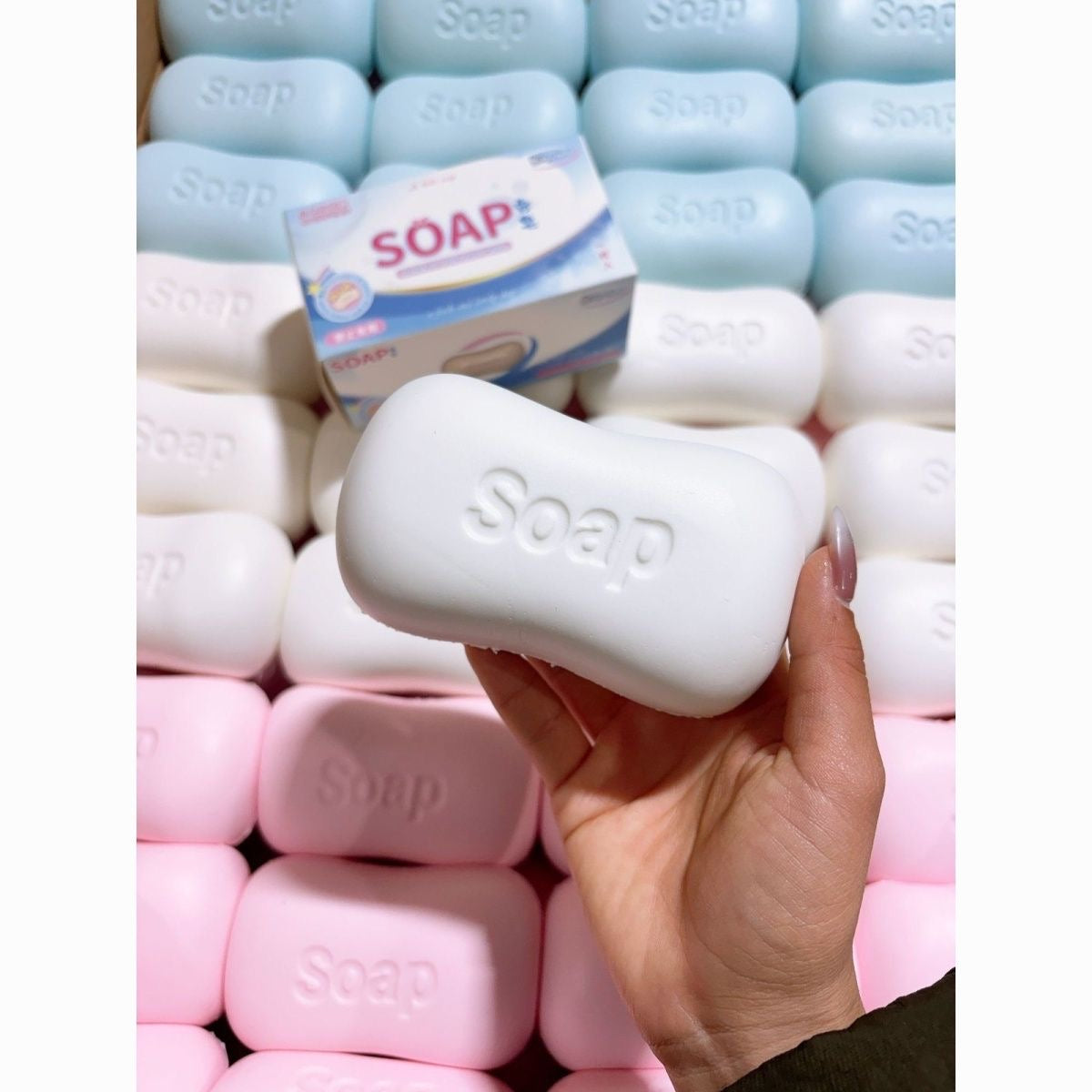 Soap Bar Slow-Rising Squishy – Rounded Squeeze Toy with Molded Soap Lettering in White, Pink or Blue