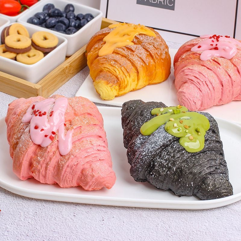 Croissant Slow-Rising Squishy – Matcha Green, Sesame Black, Strawberry Pink or Bread Brown Bakery-Inspired Squeeze Toy