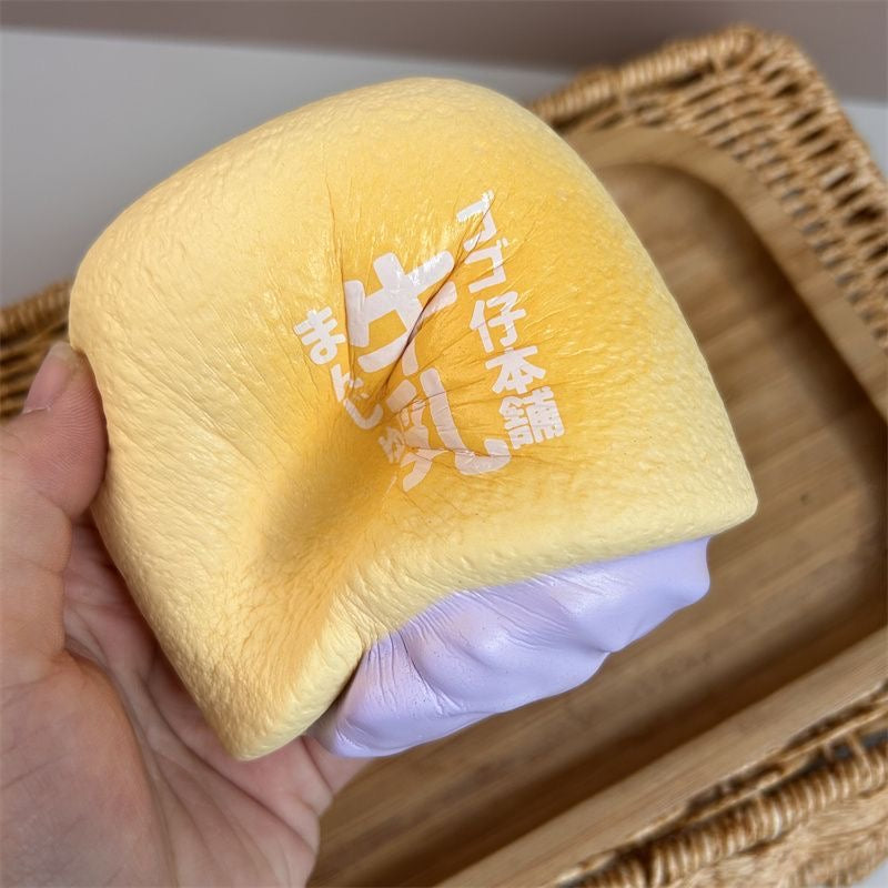 Milk Bun Slow-Rising Squishy – Honey Yellow & Chocolate Black Printed Bread Squeeze Toy