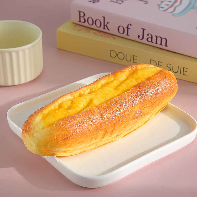 Youtiao Slow-Rising Squishy – Golden Chinese Fried-Dough Bread Shape with Rounded Edges and Textured Center Channel