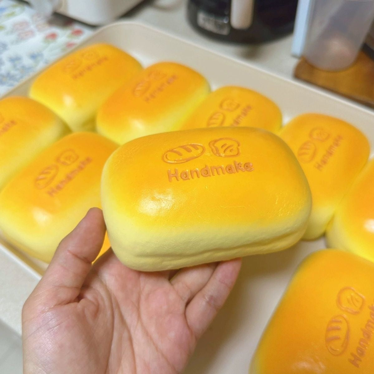 Golden Bread Loaf Slow-Rising Squishy – Rounded Rectangular Bun with Embossed Handmake Lettering and Two Bread Icons