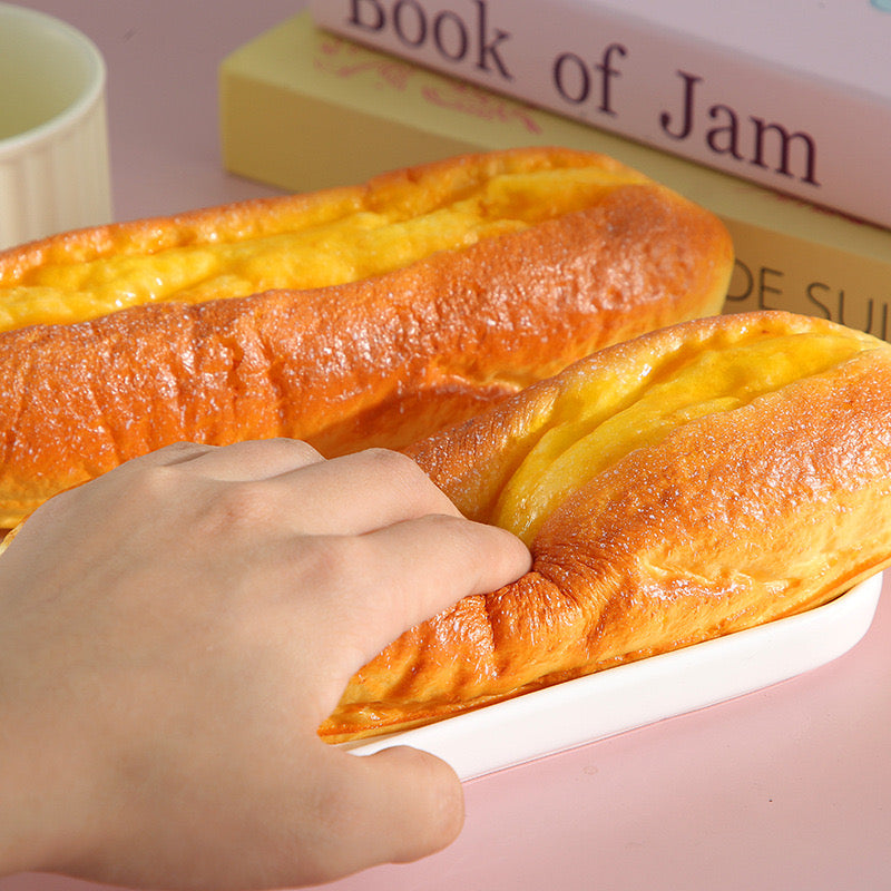 Youtiao Slow-Rising Squishy – Golden Chinese Fried-Dough Bread Shape with Rounded Edges and Textured Center Channel