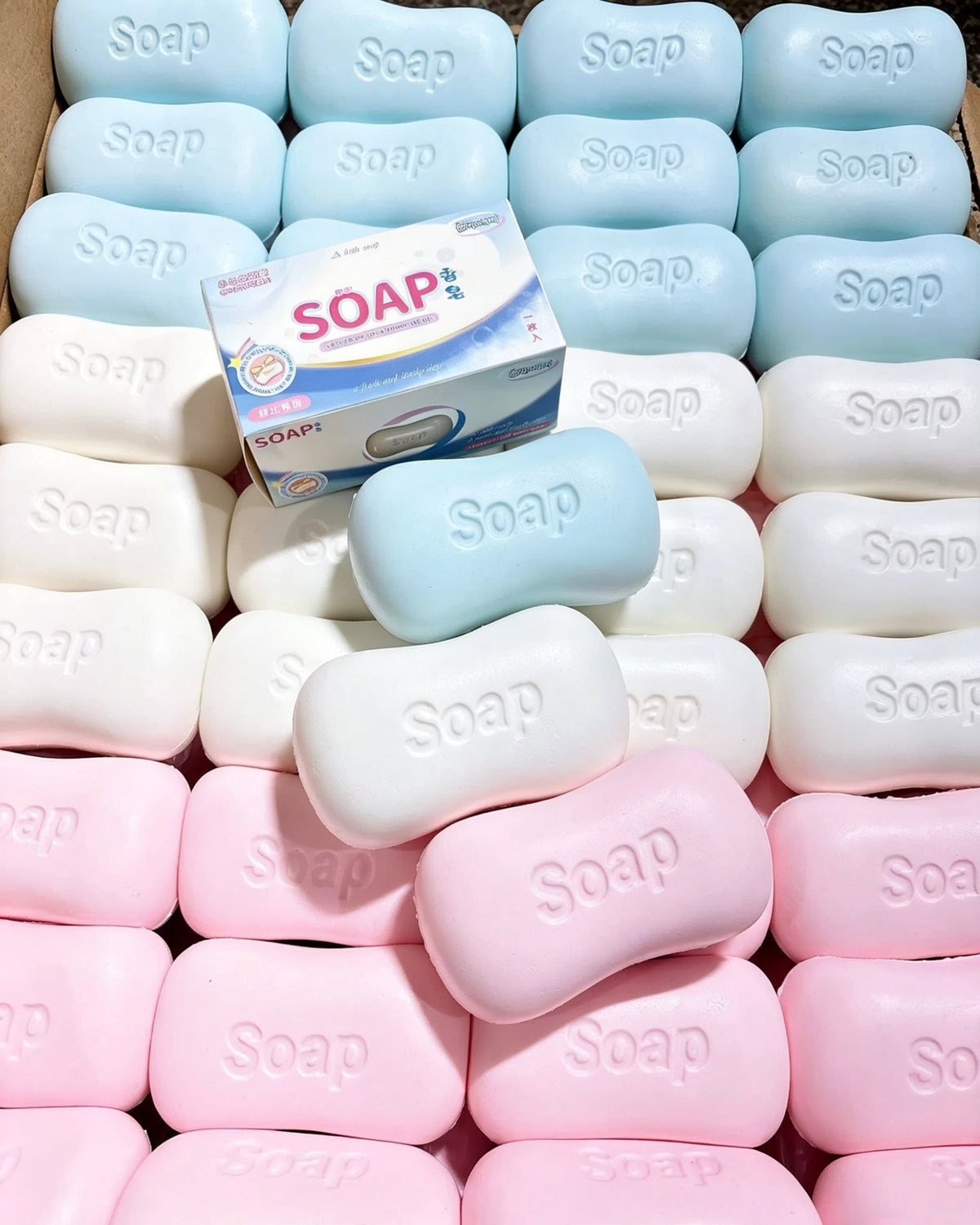 Soap Bar Slow-Rising Squishy – Rounded Squeeze Toy with Molded Soap Lettering in White, Pink or Blue