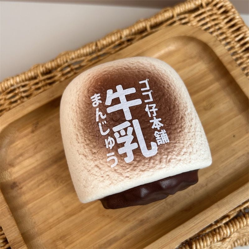 Milk Bun Slow-Rising Squishy – Honey Yellow & Chocolate Black Printed Bread Squeeze Toy