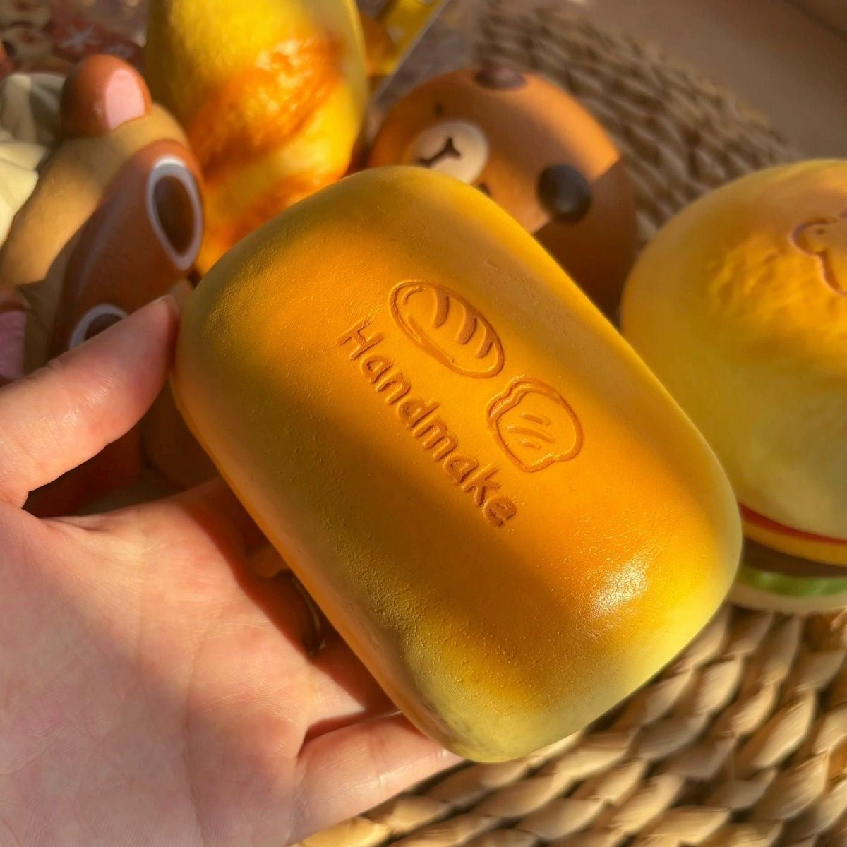 Golden Bread Loaf Slow-Rising Squishy – Rounded Rectangular Bun with Embossed Handmake Lettering and Two Bread Icons
