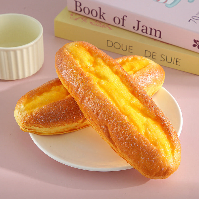 Youtiao Slow-Rising Squishy – Golden Chinese Fried-Dough Bread Shape with Rounded Edges and Textured Center Channel