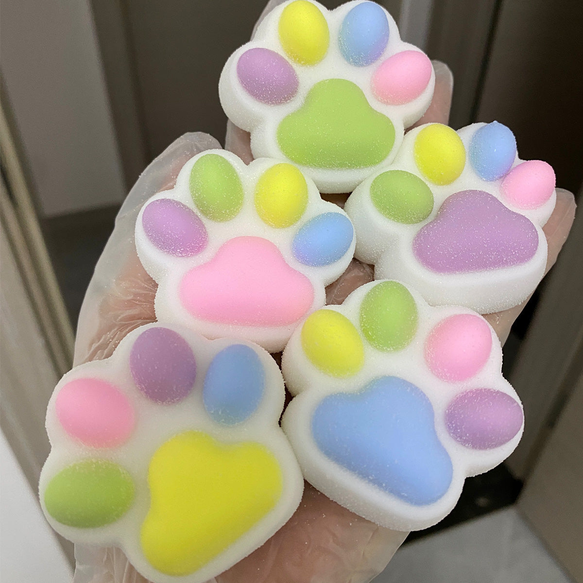 Handmade Silicone Rainbow Cat's Paw Taba Squishy Toy  - Christmas Series – product image 3