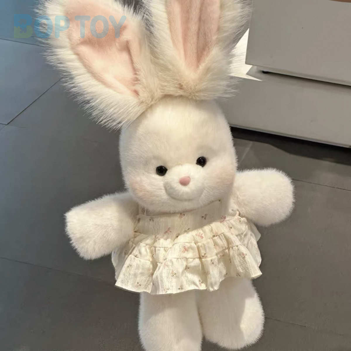 Little Y white bunny plush, actual dress-held photograph