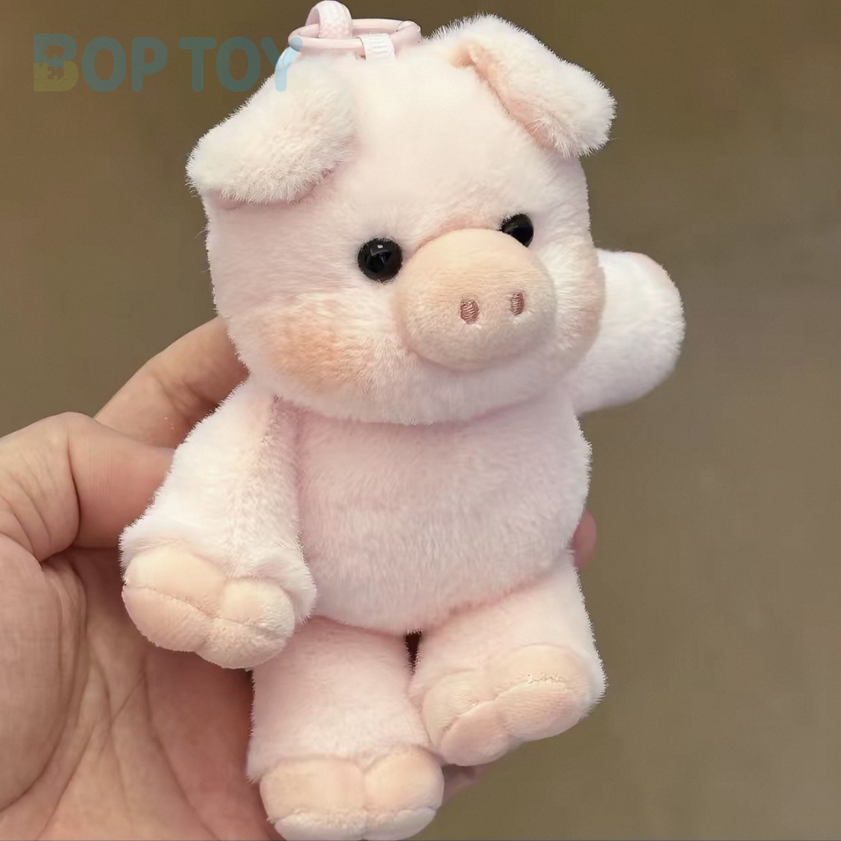 Huhu Pink Pig plush bag charm, actual product photograph