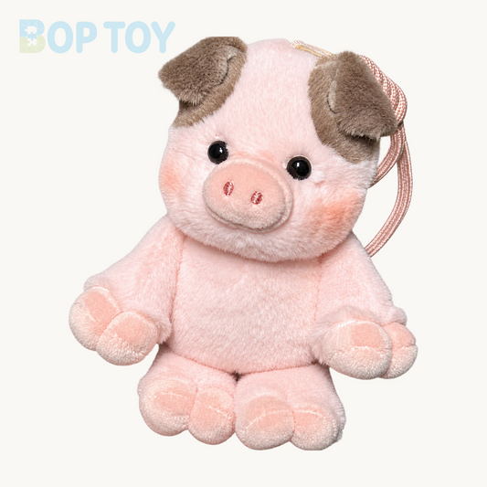 Xiangxiang Pink & Brown Pig plush bag charm, isolated product view