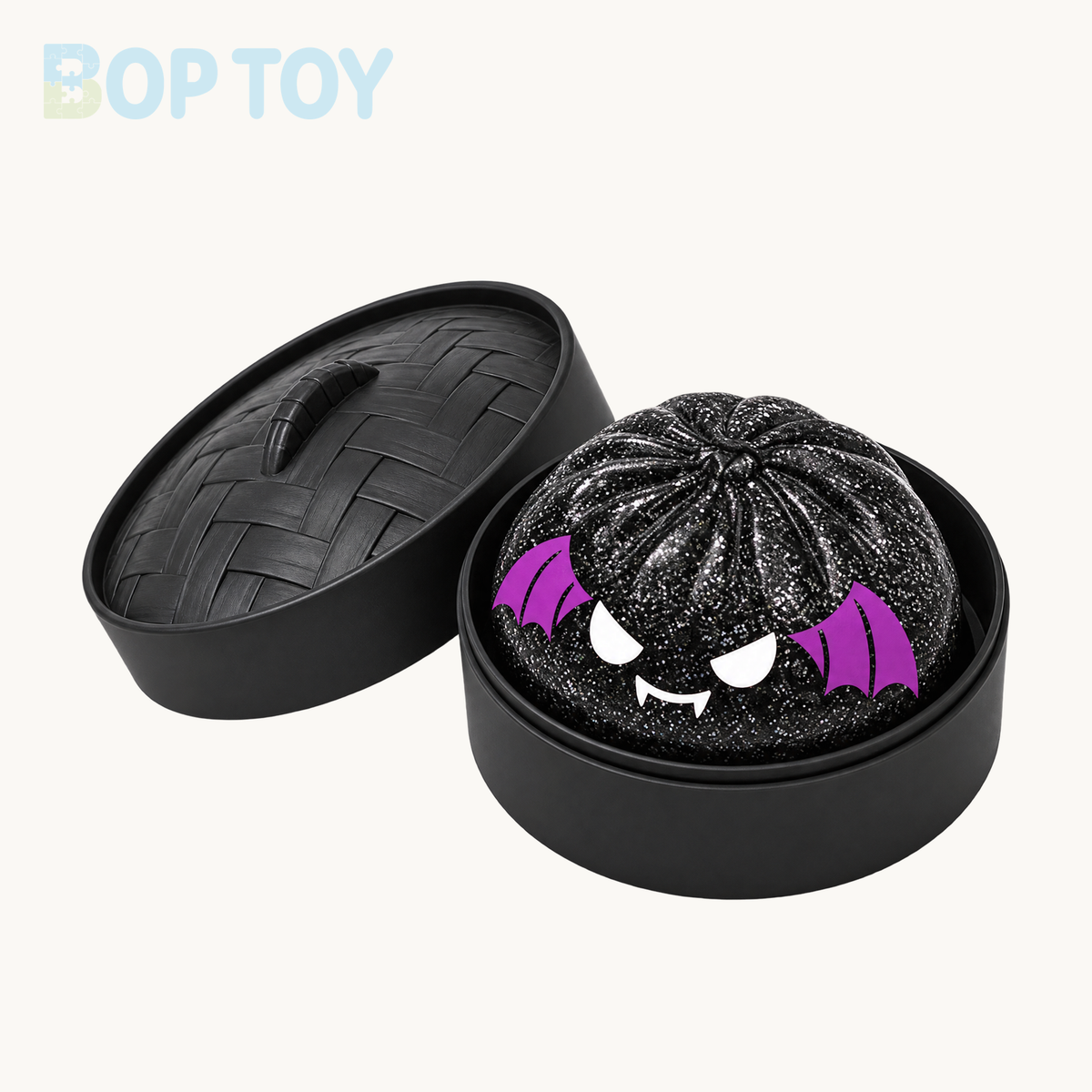 Black bat glitter bun squishy with flat purple wing graphics and matching black steamer and lid