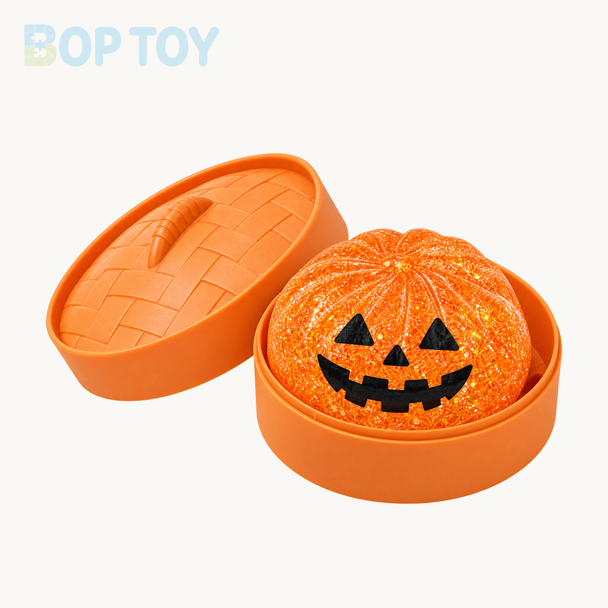 Orange jack-o-lantern glitter bun squishy with matching orange steamer and lid