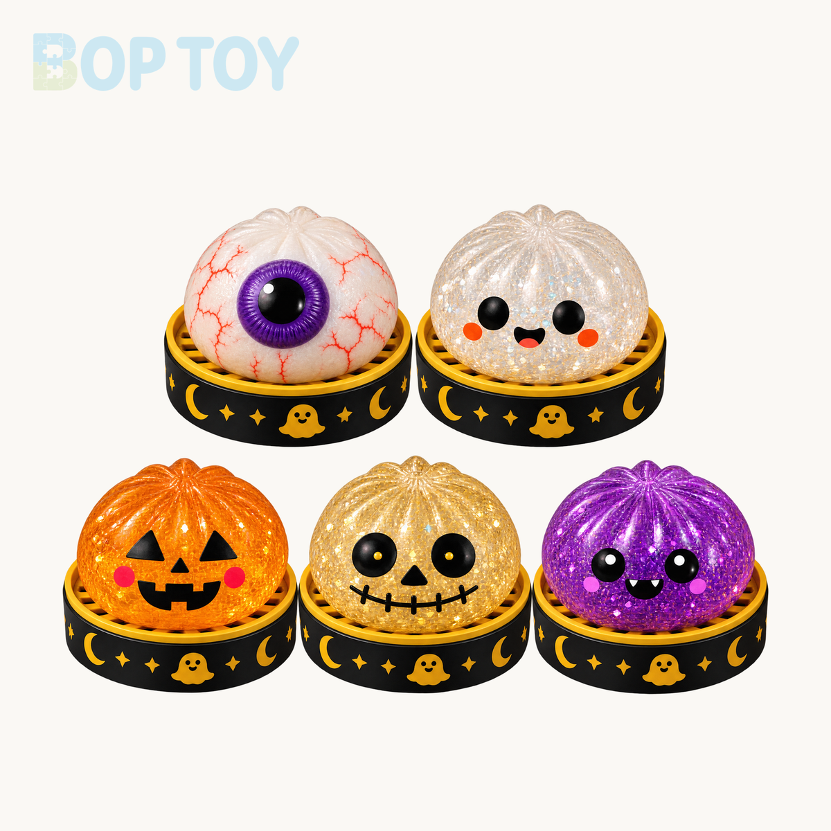 All five Halloween bun squishy designs with black and gold steamers: white ghost, gold skull, orange pumpkin, purple eyeball and purple vampire