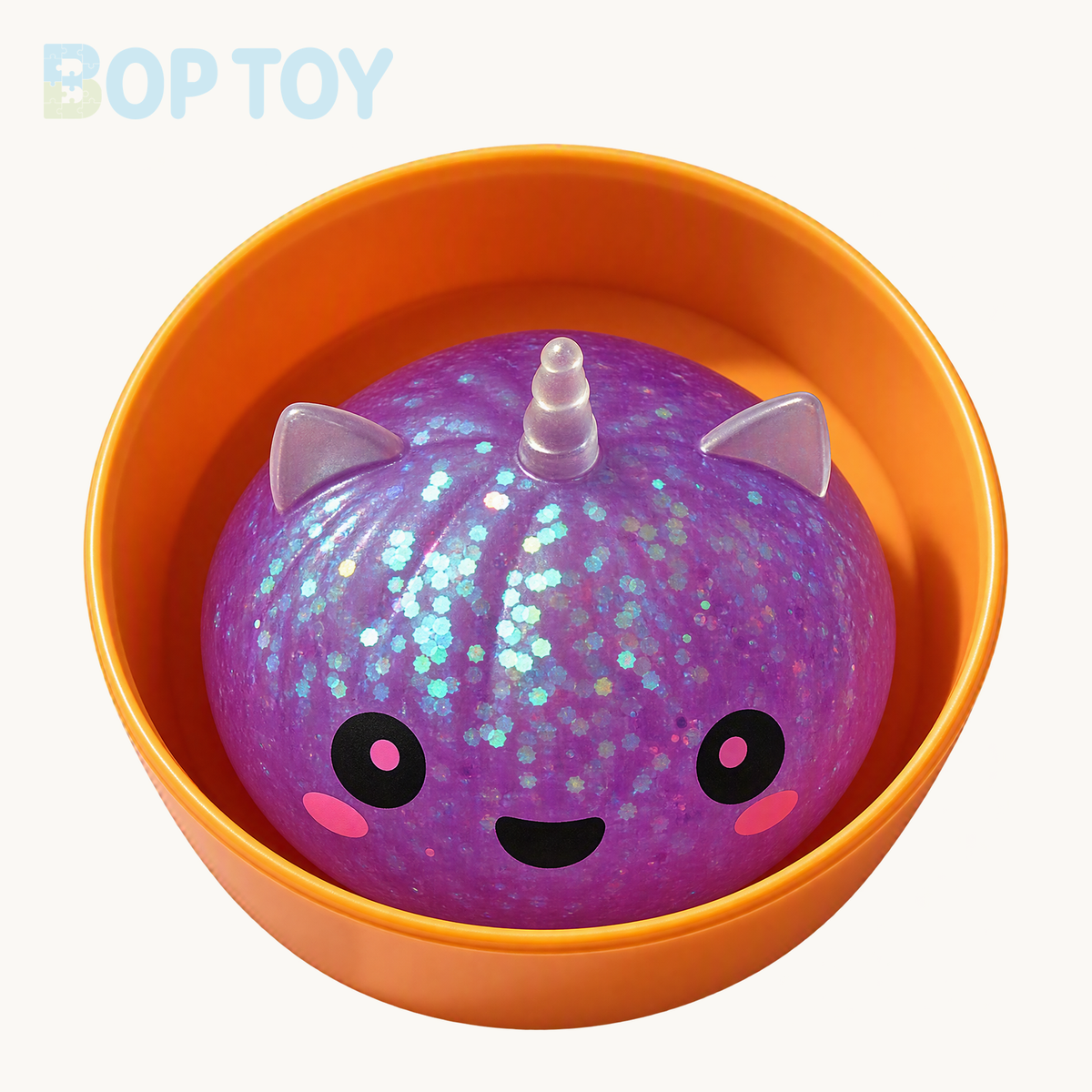Purple mini Halloween unicorn glitter squishy with included orange container