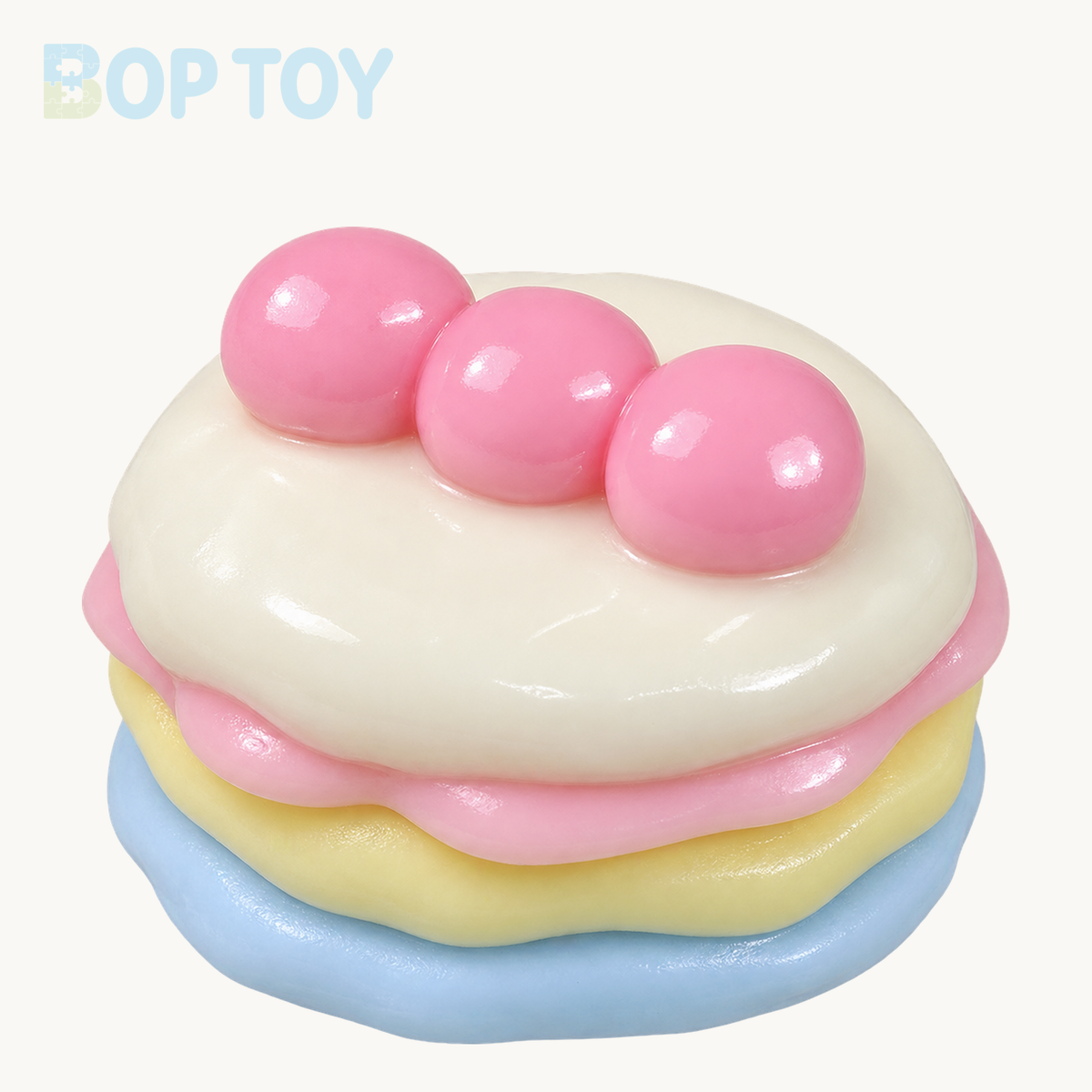 multicolor handmade silicone souffle cake squishy on BOPTOY cream background