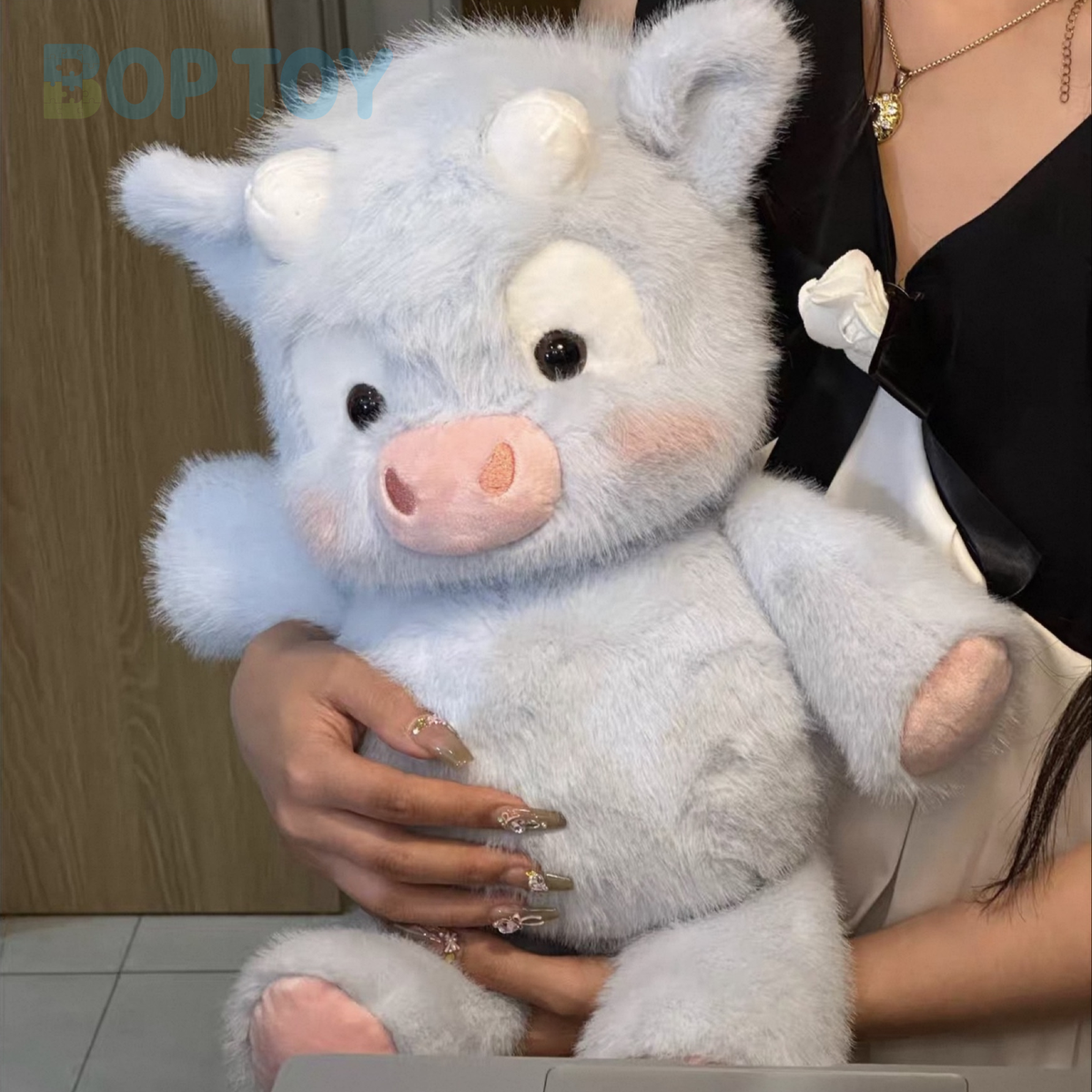 Original product photograph of the blue & white Highland cow plush