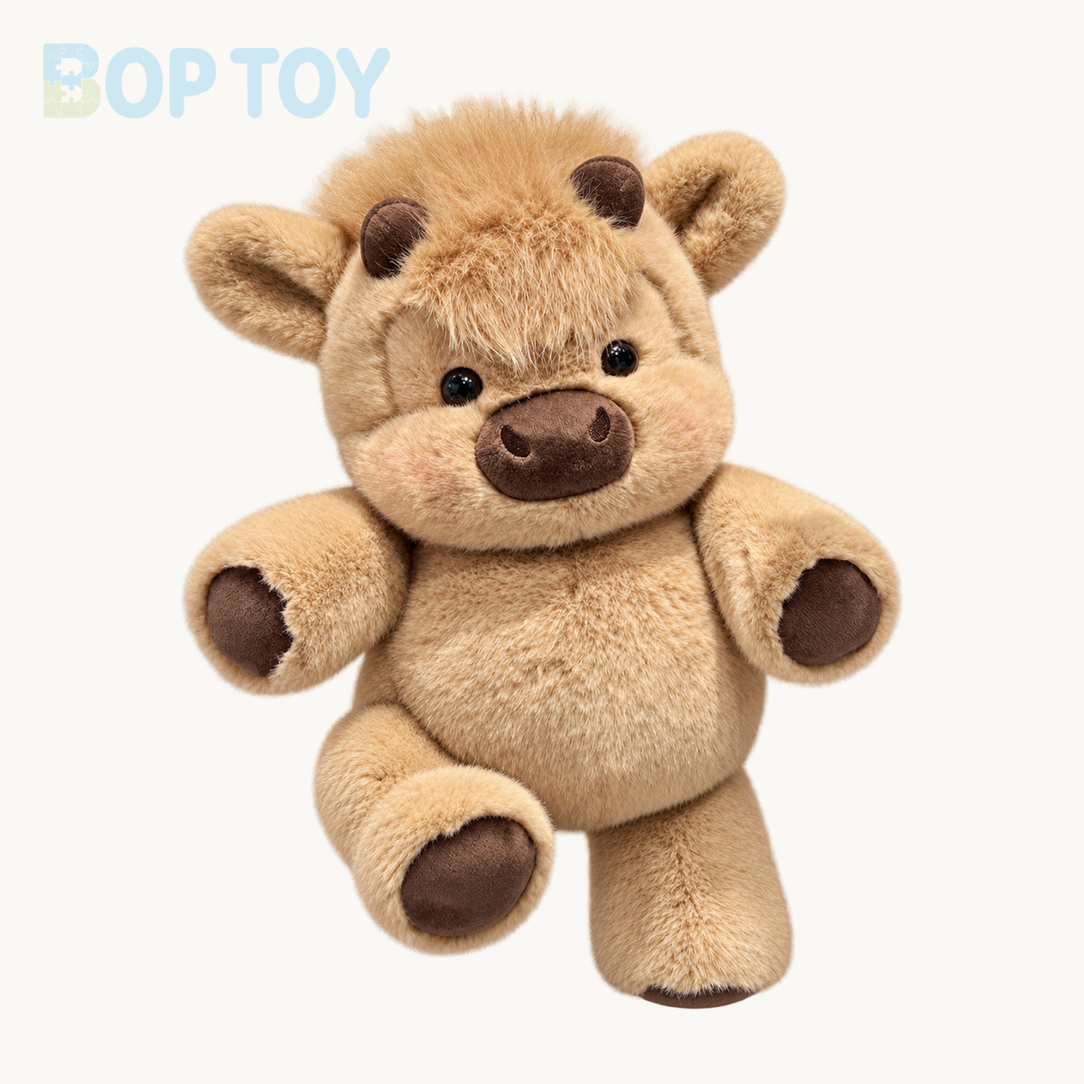 Cookie fluffy Highland calf plush on a warm ivory background