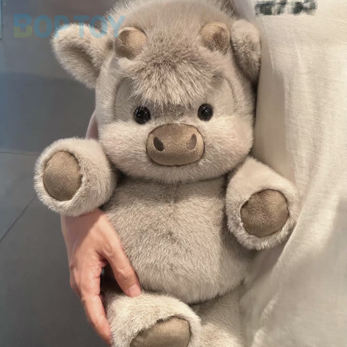Original product photograph of the grey bean Highland cow plush