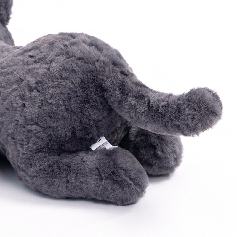 Jiji the Fluffy Black Cat Plushie Laying Down — image 10