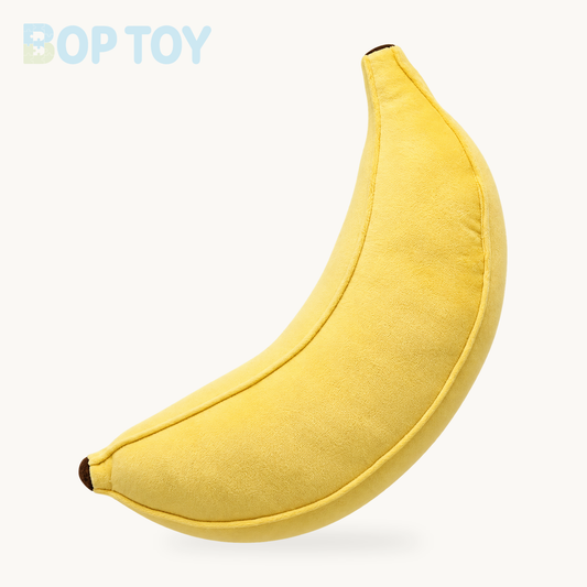 Jumbo Realistic Banana Plushie, 24-35" | 60-90 cm on a cream background