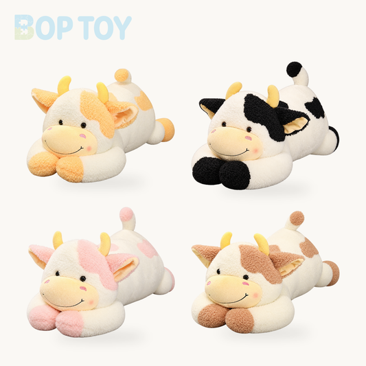 Jumbo Lounging Dairy Cow Plushie, 4 Colors, 35-43" | 90-110 cm on a cream background