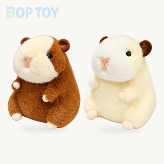 Nibbles & Popcorn Guinea Pig Plushies product collection on a cream background