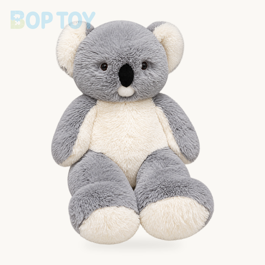 Poko the Giant Koala Plushie on a cream background